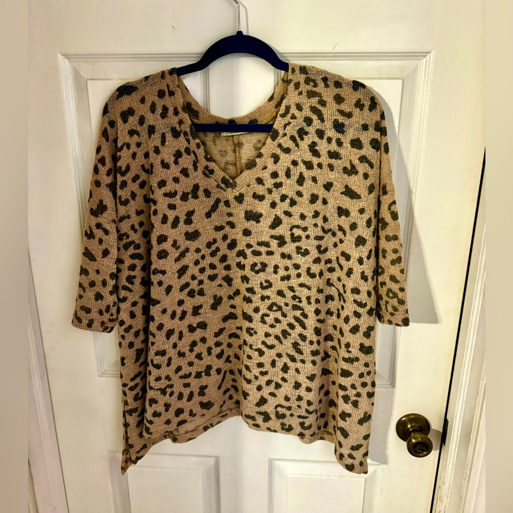 Cherish size s/m - supposed to be hangy sweater. Tan w/ black spots